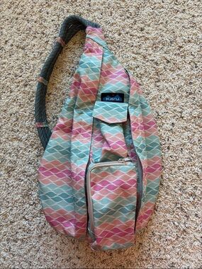 Kavu Wave Pattern Rope Sling Bag - Pink, Teal & Beige